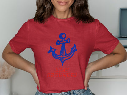 Red t-shirt with blue anchor and "STAY GROUNDED" text.