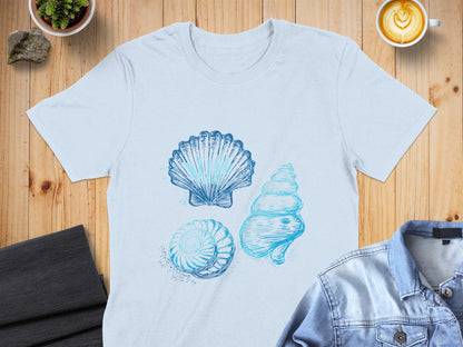 Light blue t-shirt with three sketched seashells in blue ink.