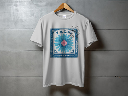 White t-shirt with a blue flower graphic and "PALM BEACH" text.
