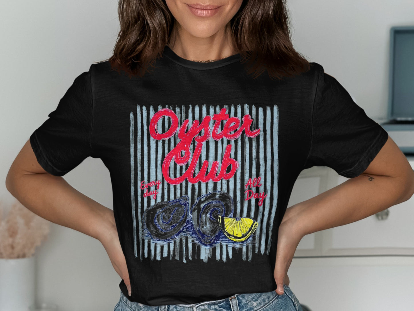 Black t-shirt with red "Oyster Club" text and blue stripes, featuring oysters and lemon.