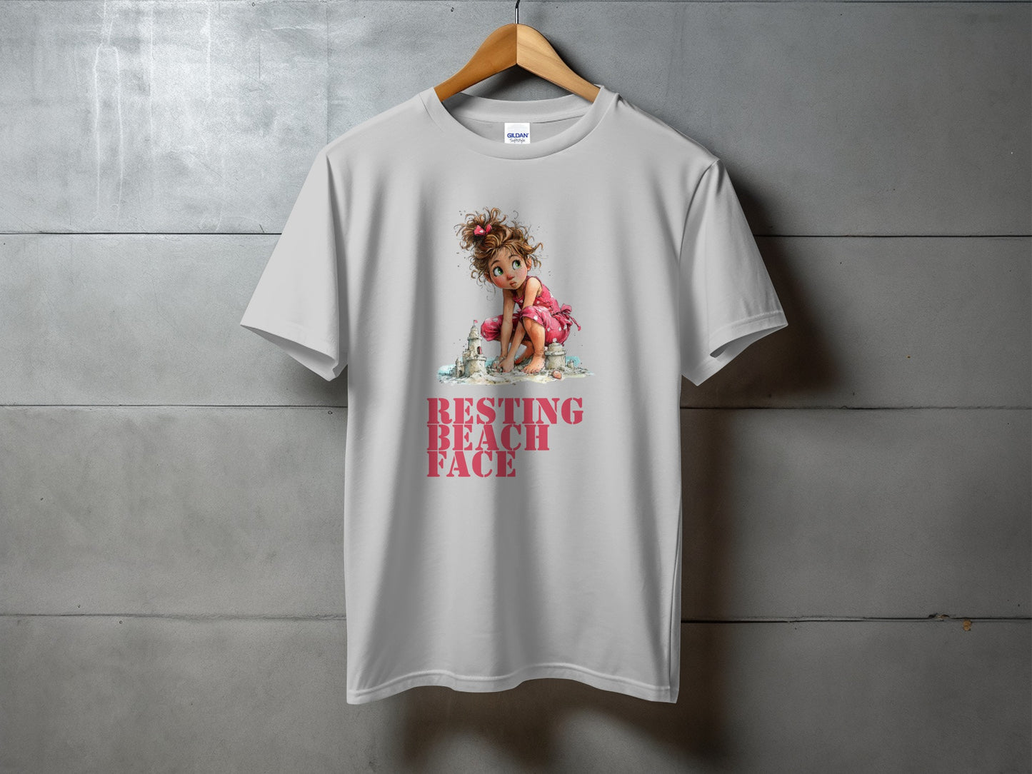 White t-shirt with a graphic of a girl and the text "Resting Beach Face."