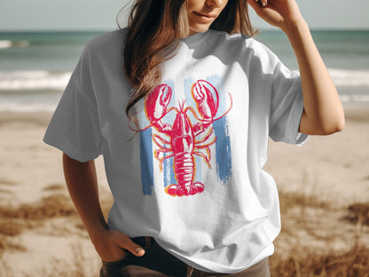 White t-shirt with a graphic of a red lobster over blue and white stripes.