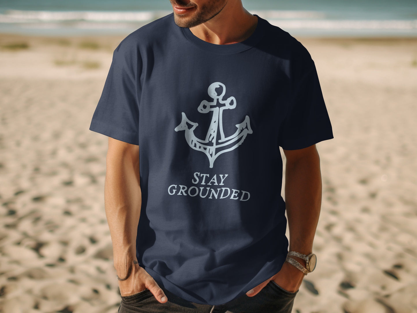 Navy t-shirt with white anchor graphic and "STAY GROUNDED" text.