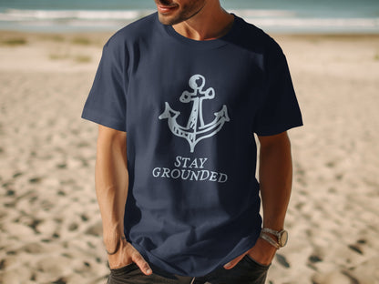 Navy t-shirt with white anchor graphic and "STAY GROUNDED" text.