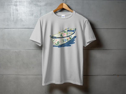 White t-shirt with a boat illustration filled with blue and pink flowers.