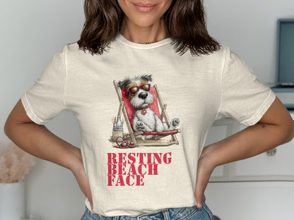 White t-shirt with a dog in a lounge chair, wearing sunglasses and the text "RESTING BEACH FACE."