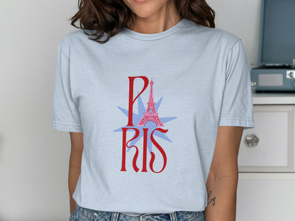 Light blue t-shirt with "PARIS" and Eiffel Tower graphic.