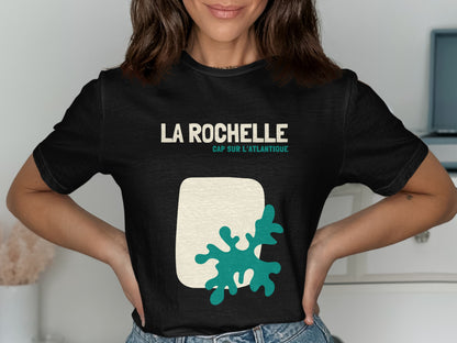 Black t-shirt with "LA ROCHELLE CAP SUR L'ATLANTIQUE" and a teal abstract design.