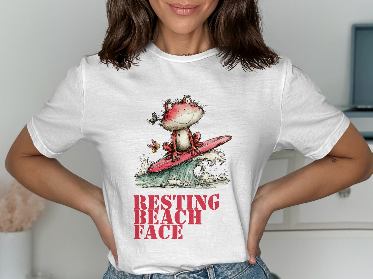 Cartoon frog on a surfboard with waves and butterflies, text "RESTING BEACH FACE".