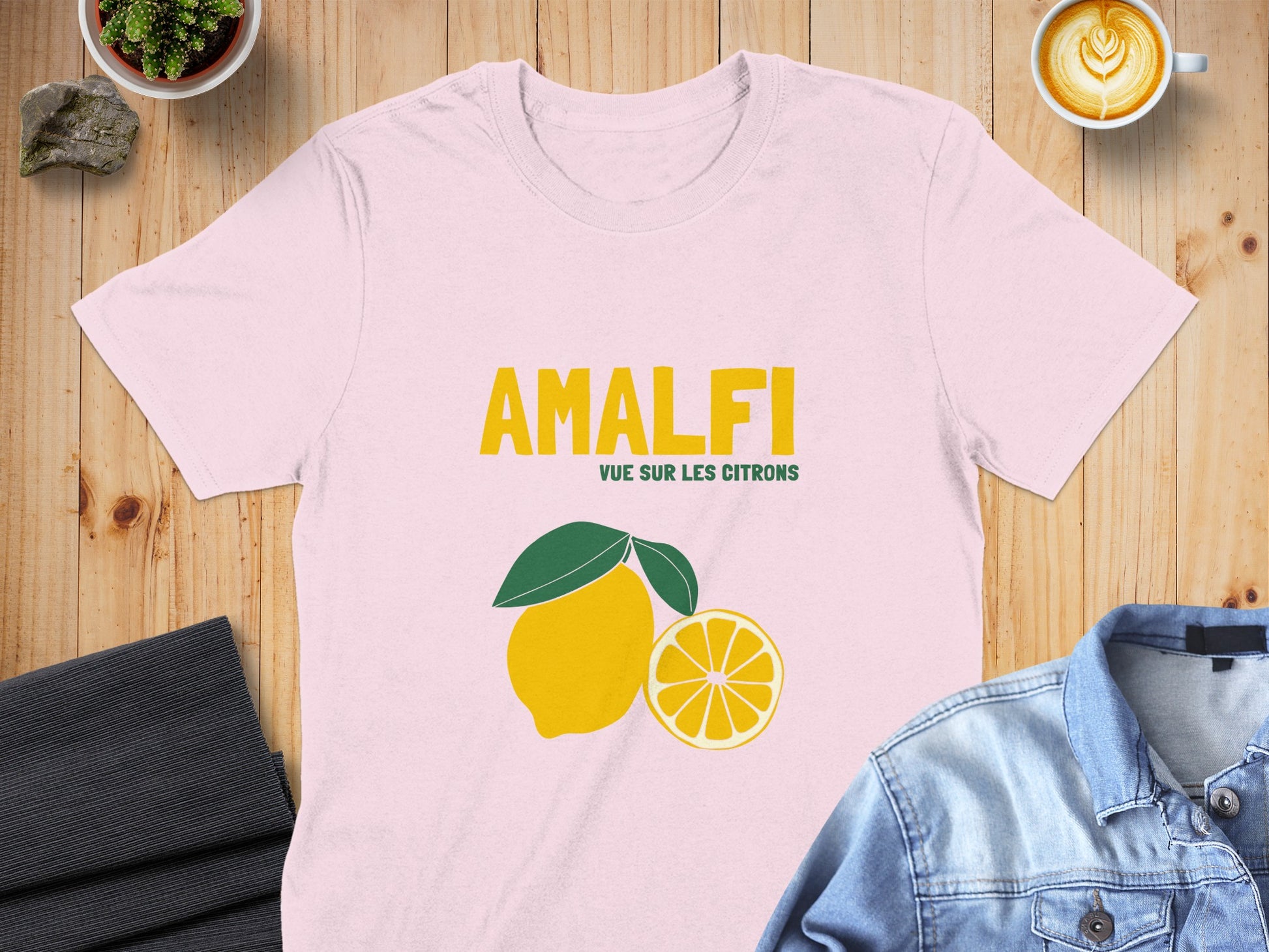 Pink t-shirt with "AMALFI VUE SUR LES CITRONS" text and a lemon graphic.