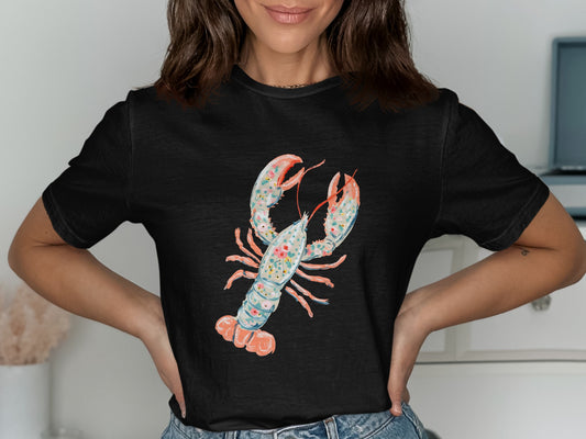 Black t-shirt featuring a stylized lobster illustration with floral accents.