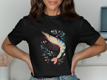 Black t-shirt featuring a colorful shrimp illustration surrounded by floral branches.
