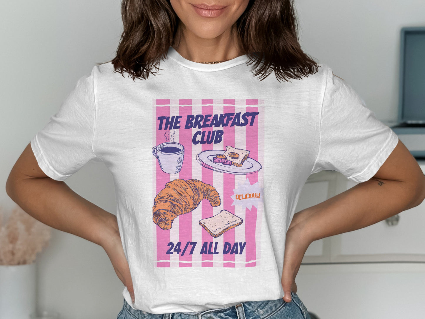 White t-shirt with pink stripes and "The Breakfast Club 24/7 All Day" text.