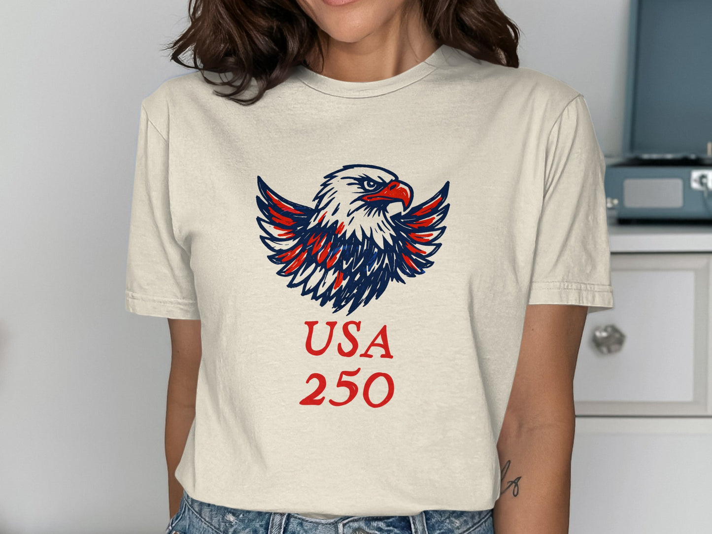 Eagle with outstretched wings and "USA 250" text on a t-shirt.