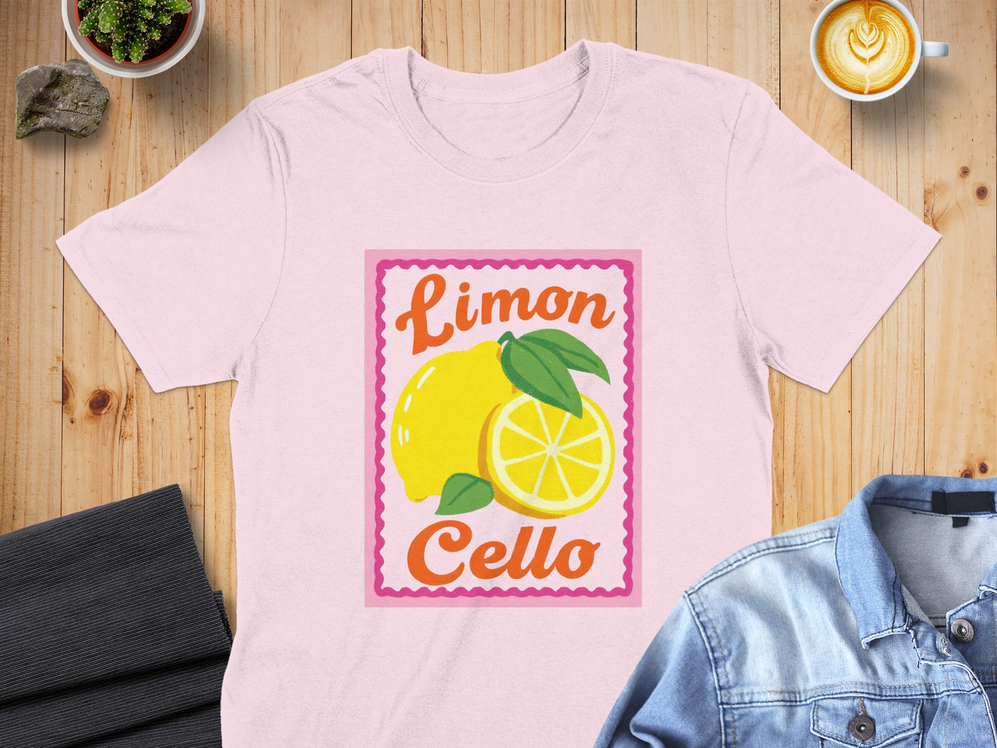 Pink t-shirt featuring a graphic of a lemon and "Limon Cello" text.
