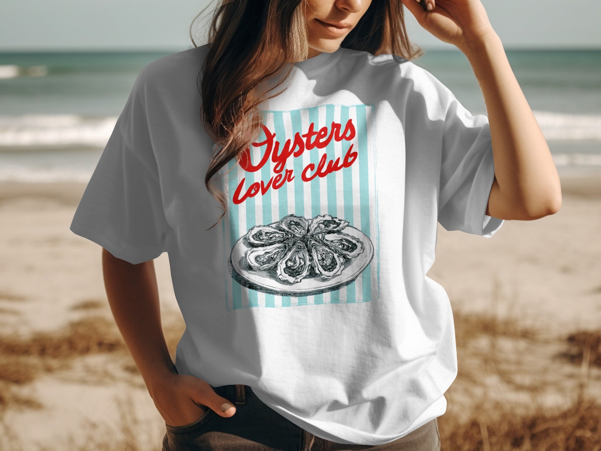 White t-shirt with "Oyster Lover Club" text and oyster illustration on blue stripes.