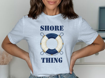 White t-shirt with "Shore Thing" text and a blue and white life preserver graphic.