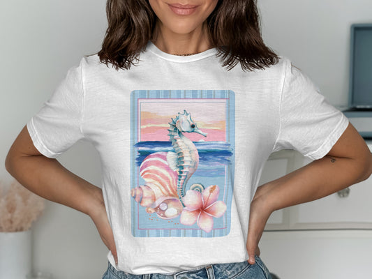Seashell and seahorse design on a white t-shirt.