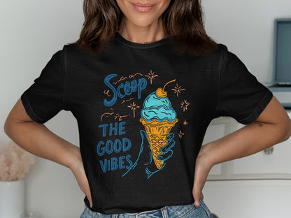 Black t-shirt with blue ice cream cone and text "Scoop the good vibes".