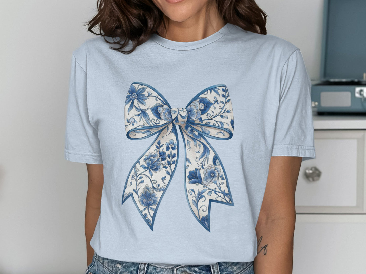 Intricate Blue Bow Design on Elegant T-shirt product