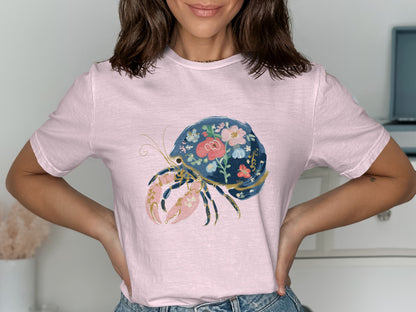 Pink t-shirt with a floral hermit crab design.