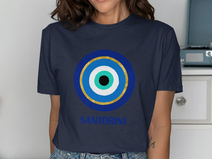 Navy t-shirt with a blue, white, and gold evil eye design and "Santorini" text.