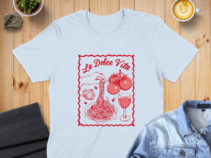 Light blue t-shirt with "La Dolce Vita" text and pasta, tomatoes, and wine illustration.