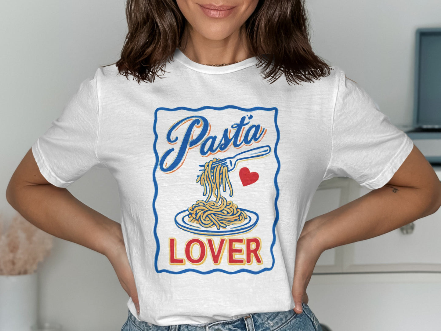 White t-shirt with "Pasta Lover" text and illustration of pasta on a fork.