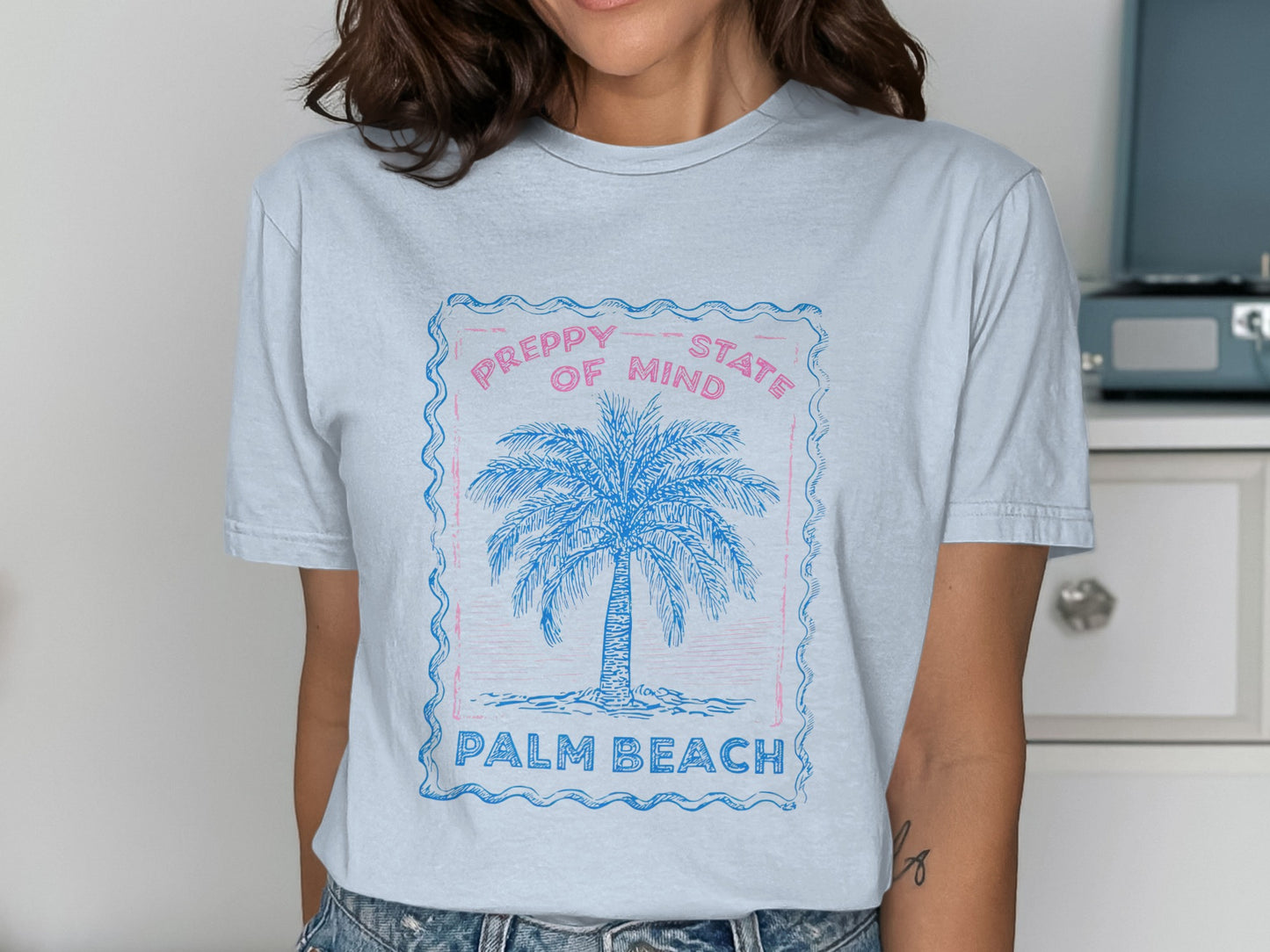 Light blue t-shirt with "Preppy State of Mind Palm Beach" text and palm tree graphic.