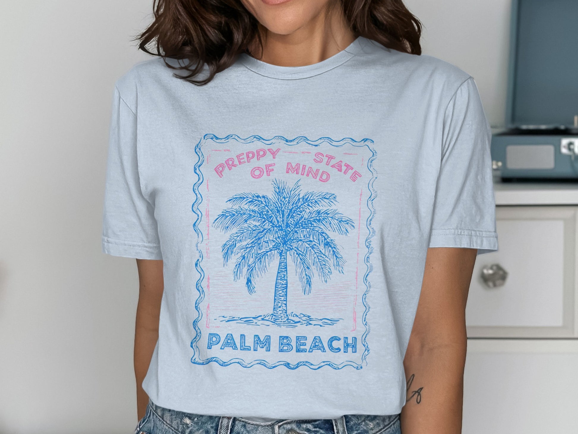 Light blue t-shirt with "Preppy State of Mind Palm Beach" text and palm tree graphic.