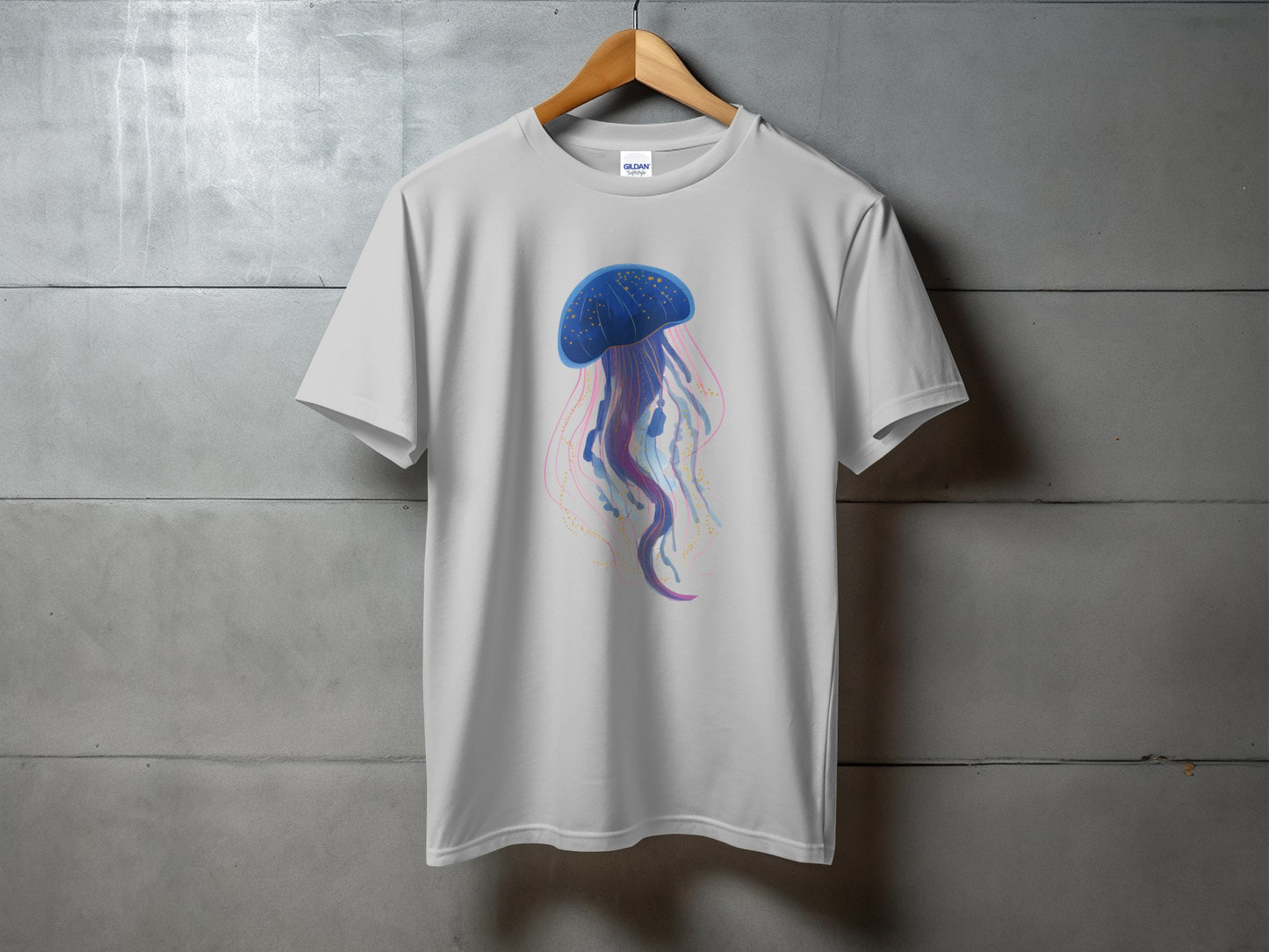 White t-shirt with a blue and pink jellyfish graphic.