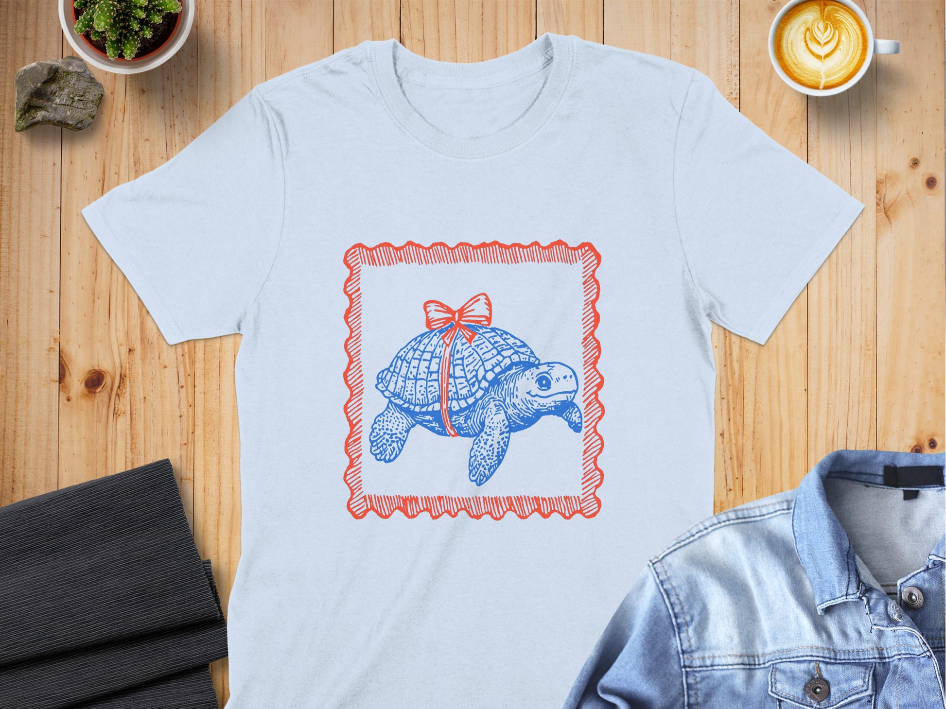 Blue Turtle with Red Bow Design Graphic Tee product