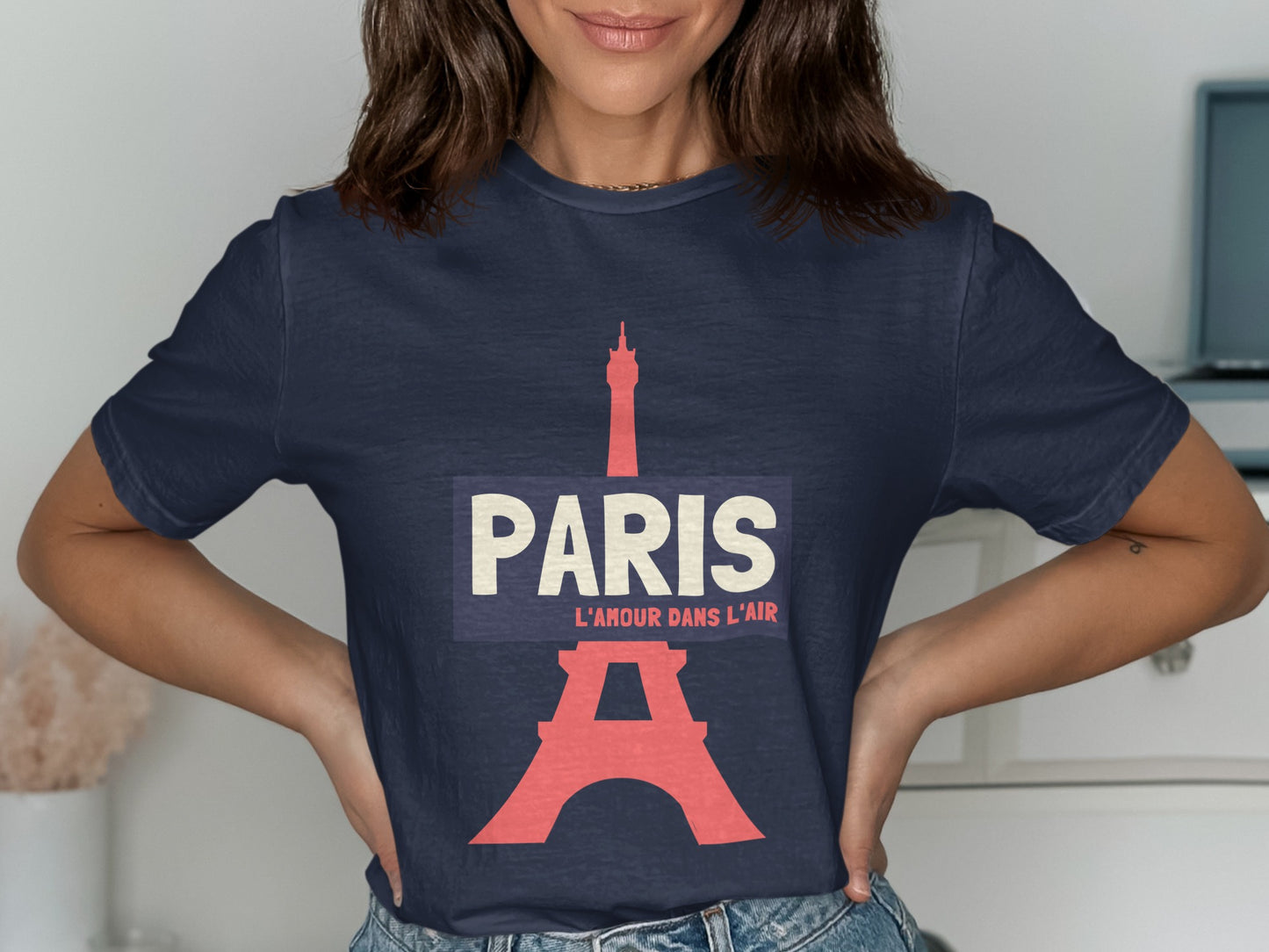 Navy t-shirt with "PARIS L'AMOUR DANS L'AIR" and Eiffel Tower graphic.