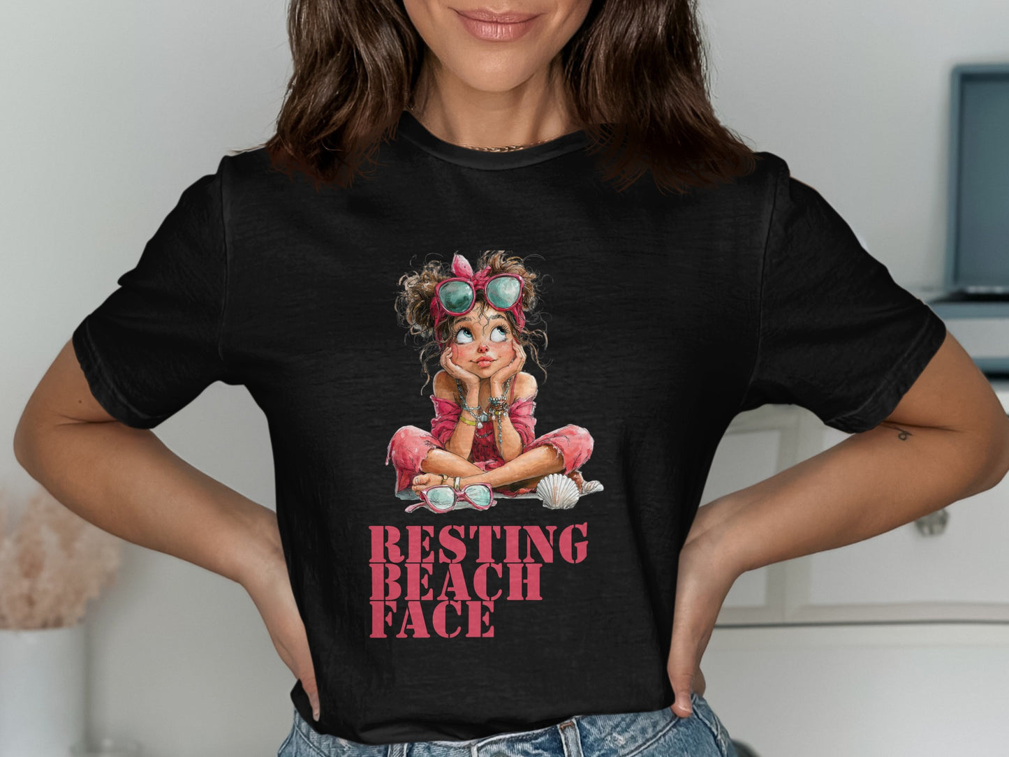 Black t-shirt with "Resting Beach Face" graphic of a girl with sunglasses and a seashell.