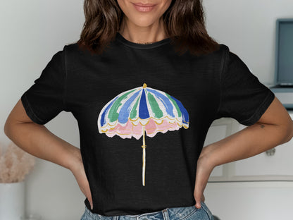 Black t-shirt with a colorful beach umbrella graphic on the front.