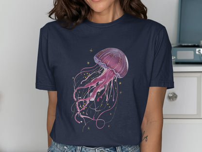 Navy t-shirt with a pink watercolor jellyfish and gold glitter design.
