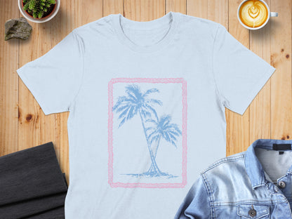 Light blue t-shirt with a pink framed palm tree graphic.