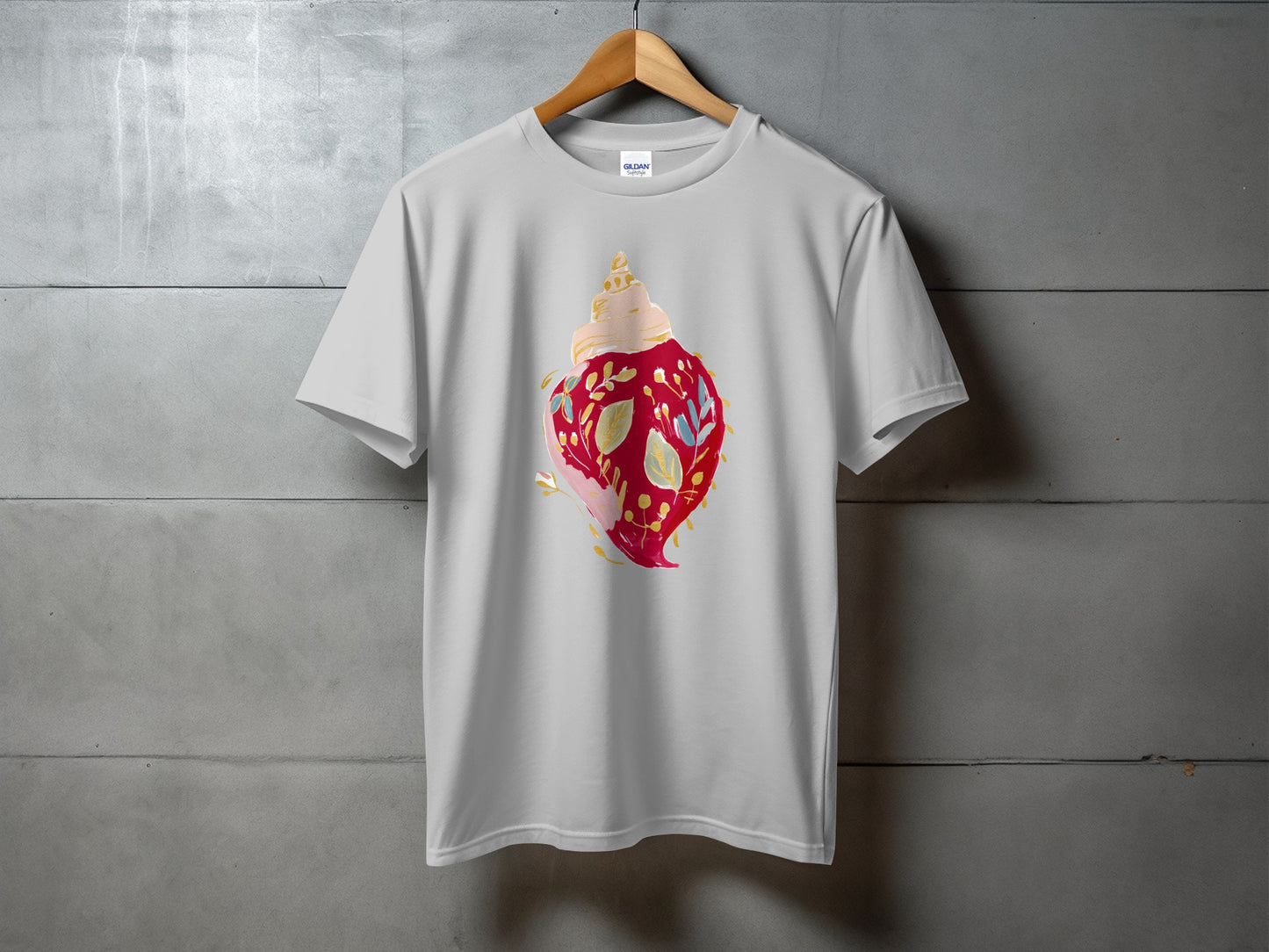 White t-shirt with a red and yellow conch shell graphic.