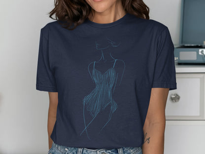 Navy t-shirt with a minimalist blue line drawing of a woman in a dress.