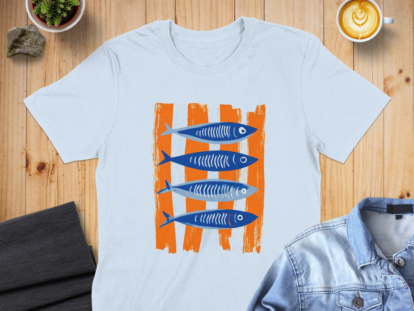 Four blue fish with white stripes on an orange striped background.