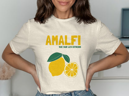 Cream t-shirt with yellow text "AMALFI VUE SUR LES CITRONS" and lemon graphic.