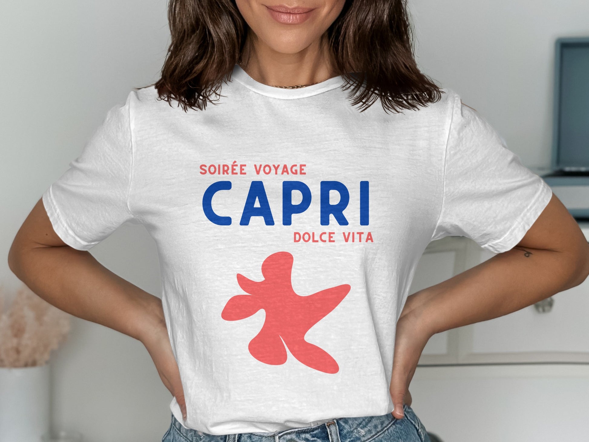 White t-shirt with "CAPRI DOLCE VITA" and red abstract shape.