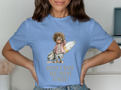 T-shirt with illustration of child with surfboard and text "RESTING BEACH FACE".