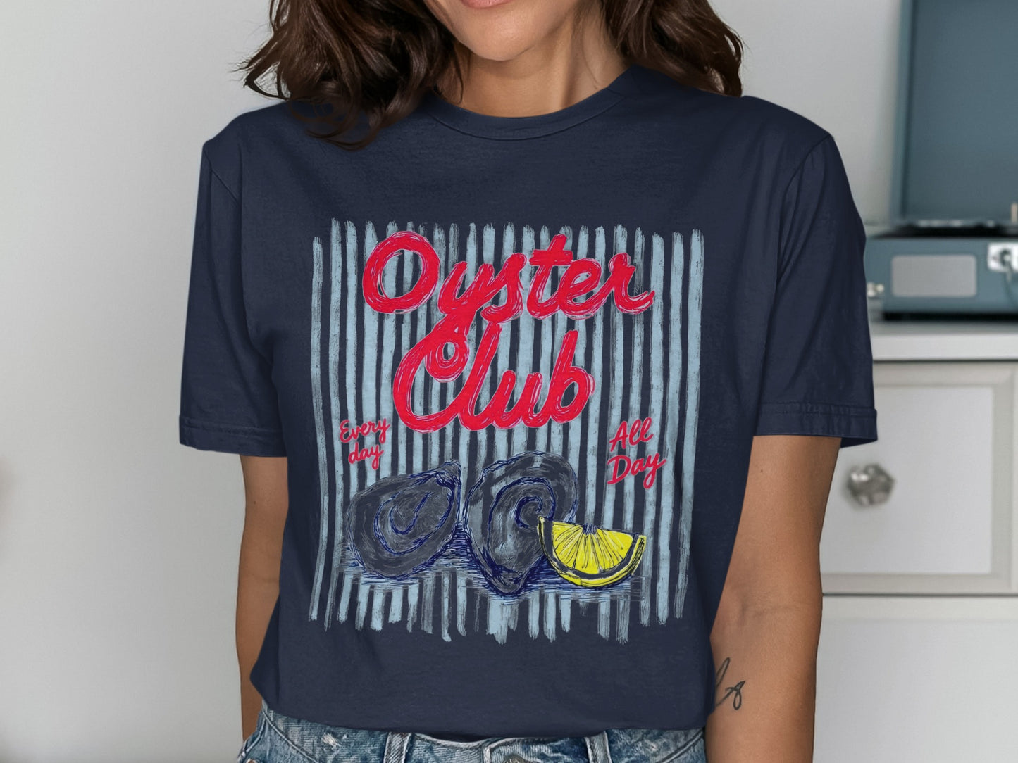 Navy t-shirt with "Oyster Club Every Day All Day" and oyster illustration.