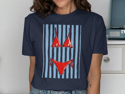 Navy t-shirt featuring a red bikini design with blue and light blue stripes.