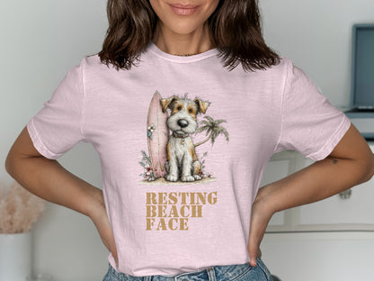 Dog sitting by a surfboard and palm tree with "RESTING BEACH FACE" text.