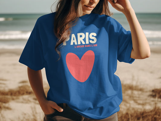 Blue t-shirt with "PARIS L'AMOUR DANS L'AIR" and a large red heart.