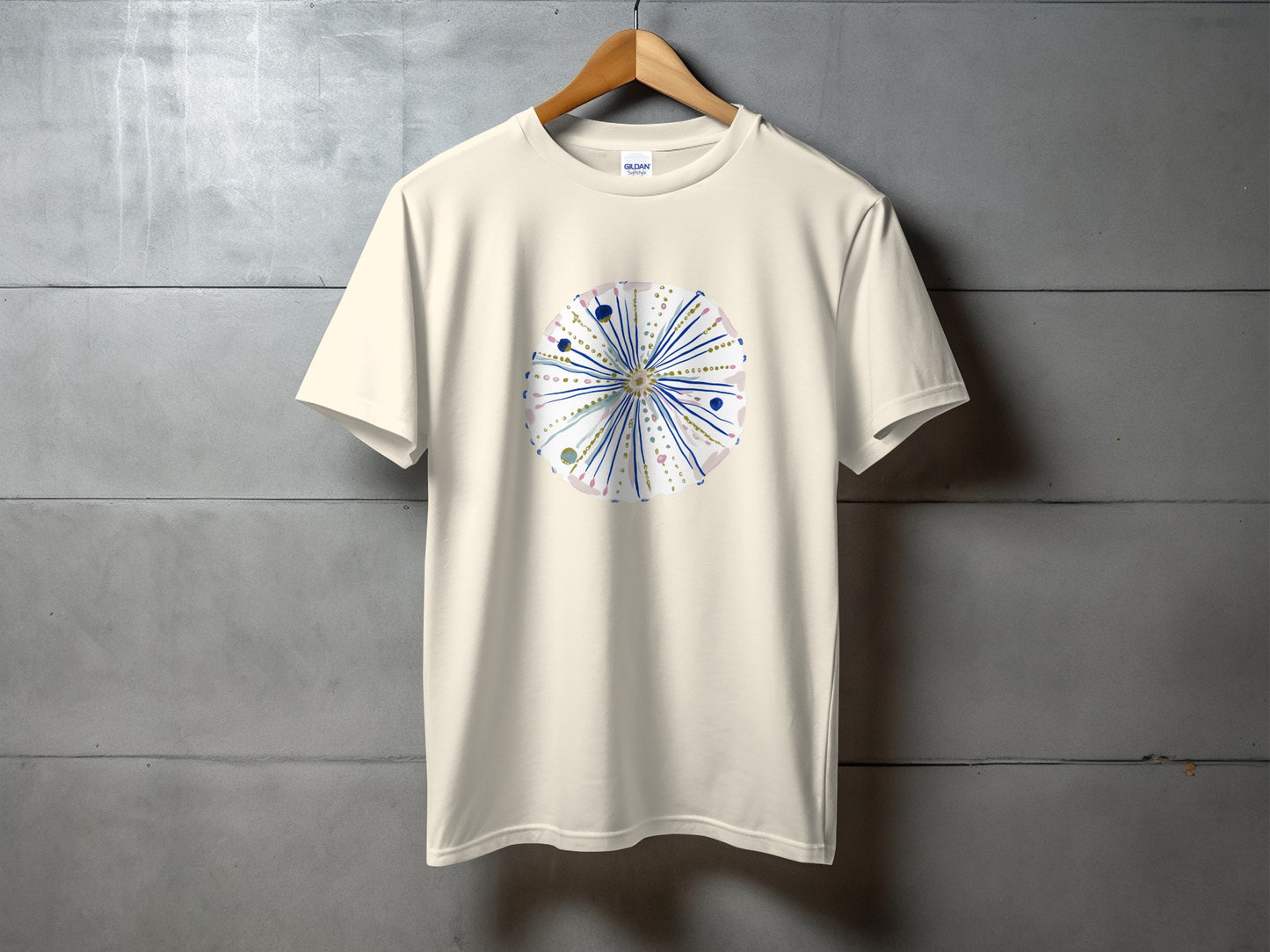 Cream t-shirt with a watercolor sea urchin design.