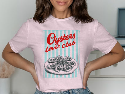 Pink t-shirt with "Oysters Lover Club" text and a plate of oysters.
