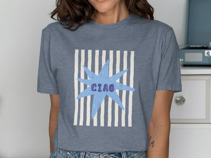 Blue t-shirt with purple "Ciao" text on a starburst over white stripes.